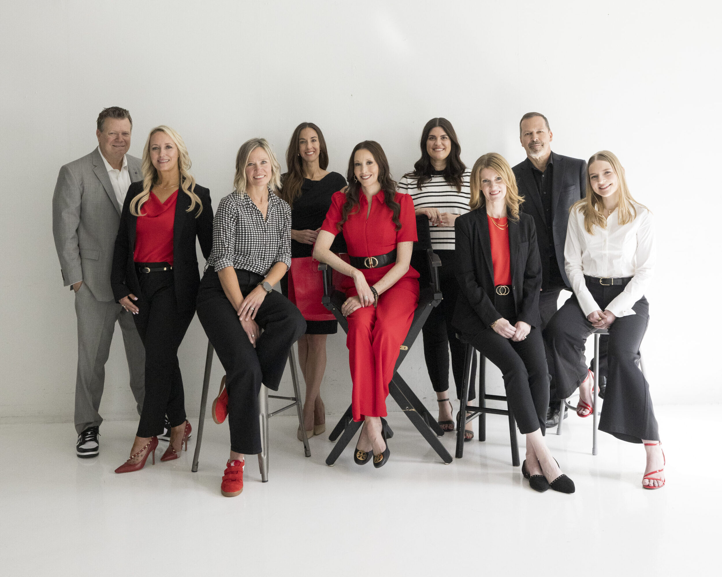 team photo of nine professionals