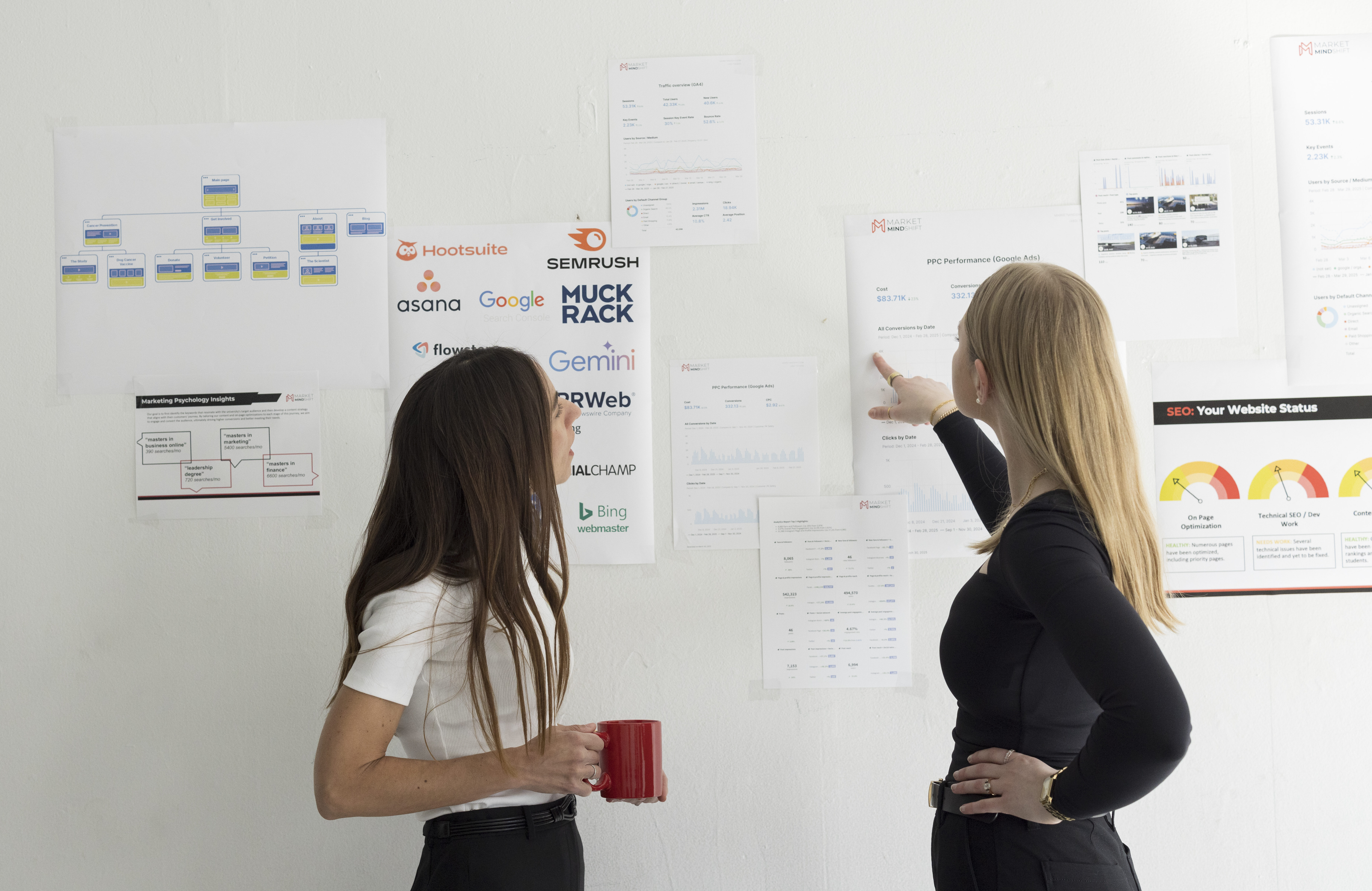 two professionals reviewing data