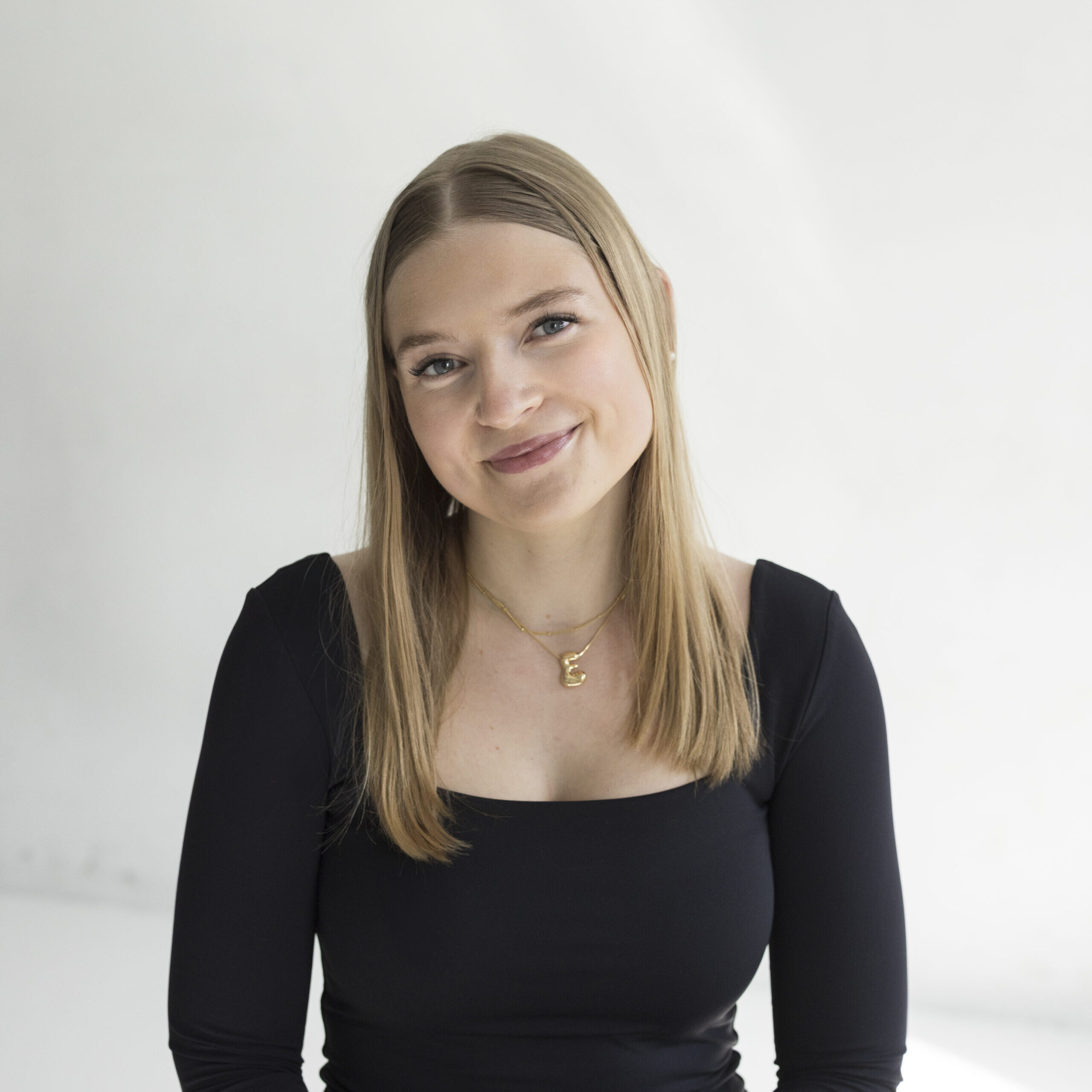 headshot of team member emma